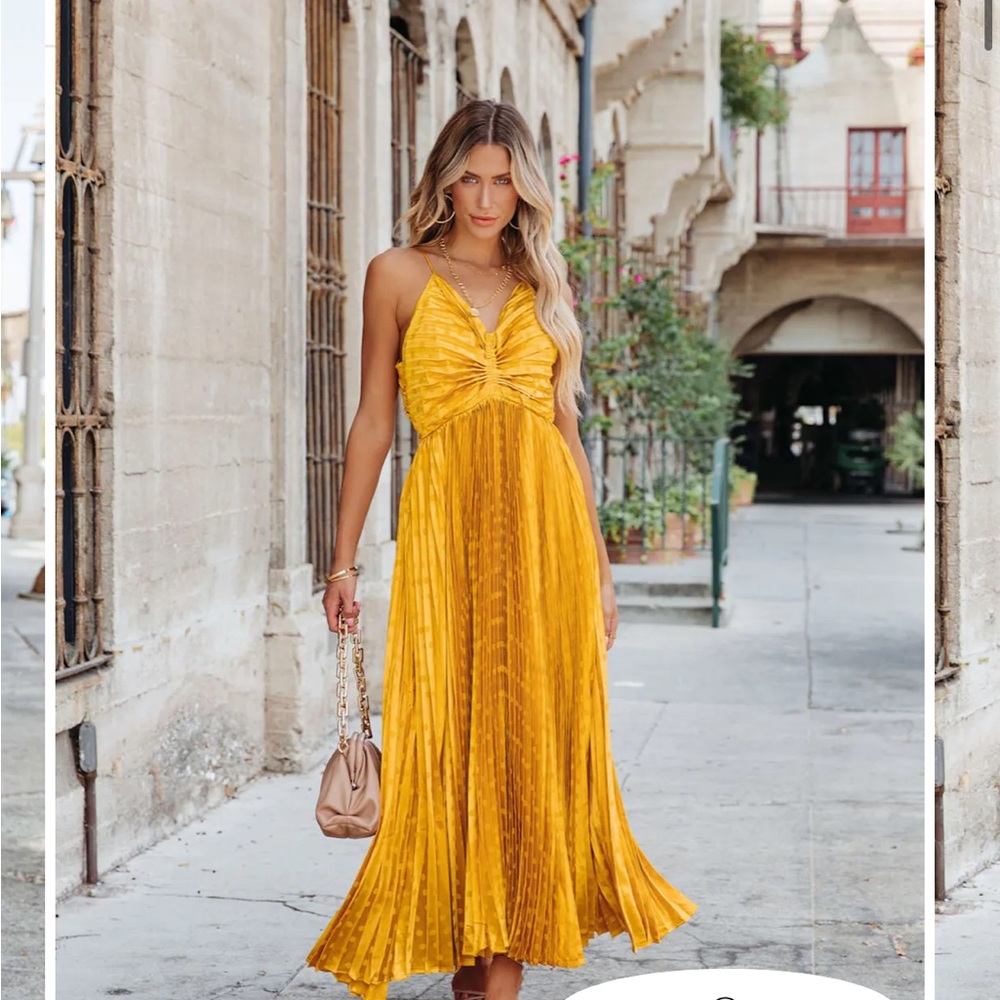 Marigold colored long formal dress.